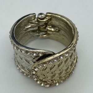 Gold and silver colored ring w/ cut crystals